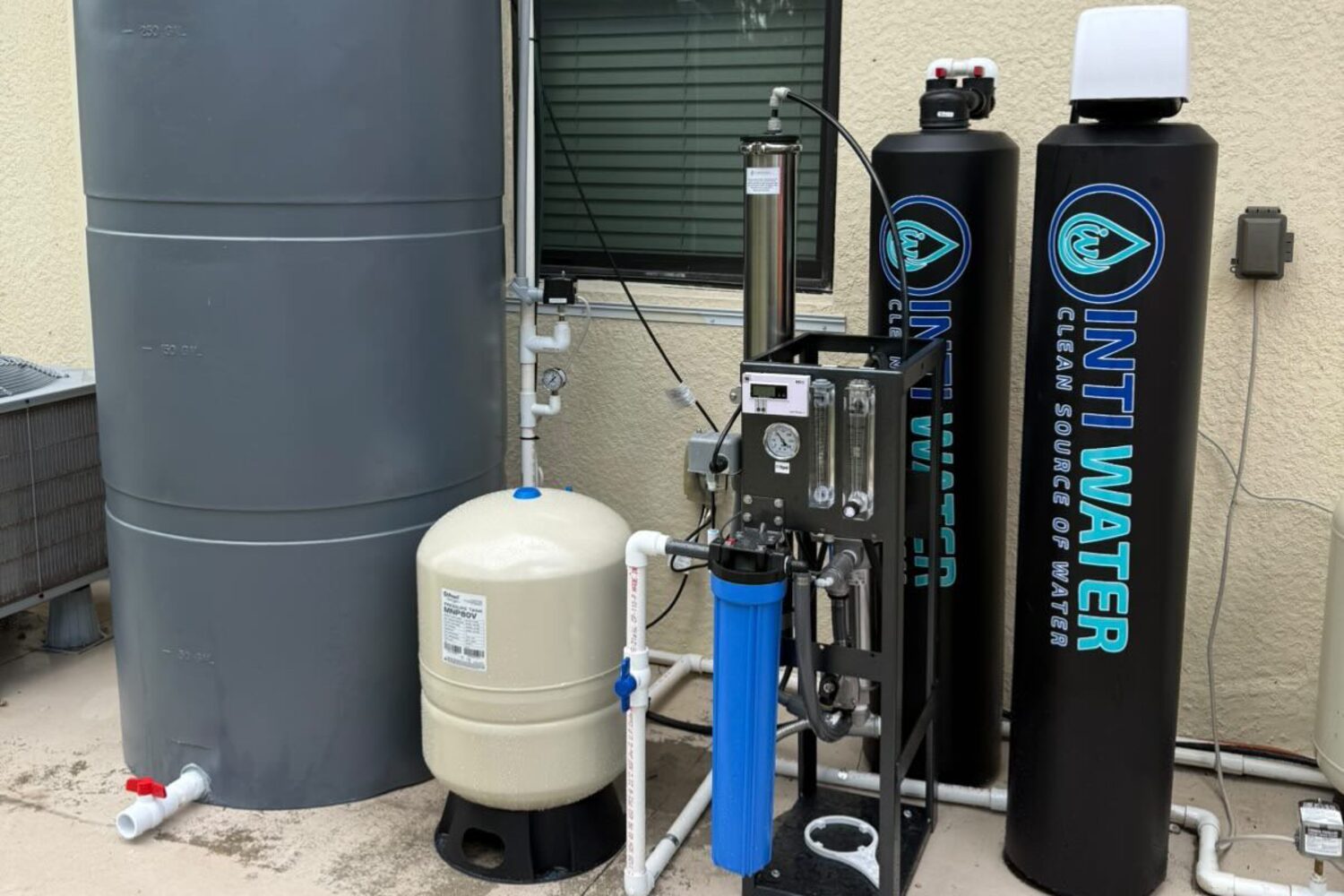 Complete whole-house reverse osmosis system with storage tank, pressure tank, membrane rack and Inti Water treatment tanks